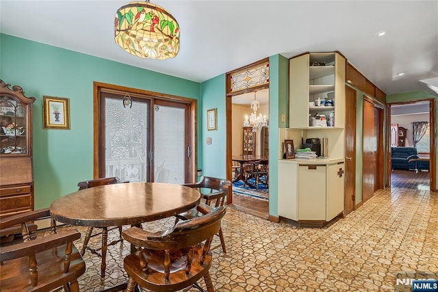 dining space featuring an inviting chandelier and recessed lighting