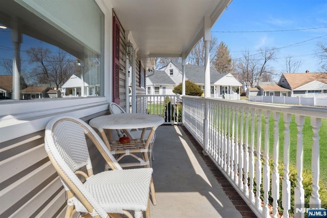 balcony featuring a residential view