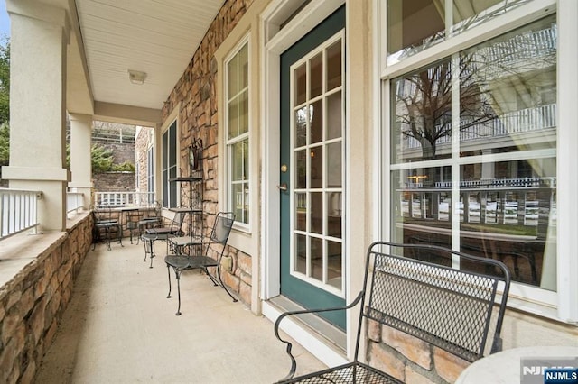 balcony featuring a porch