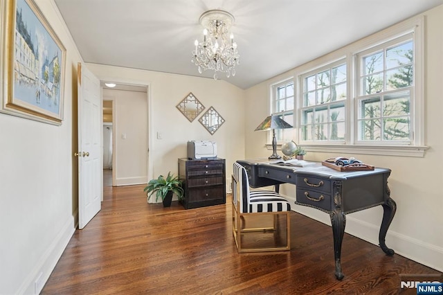 office area with a chandelier, baseboards, and wood finished floors