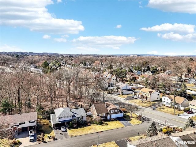 birds eye view of property with a residential view