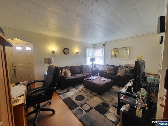 office area with crown molding and wood finished floors