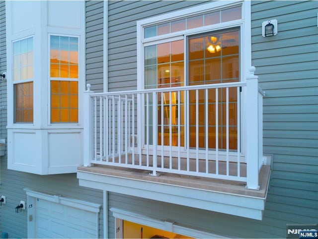 entrance to property with a balcony