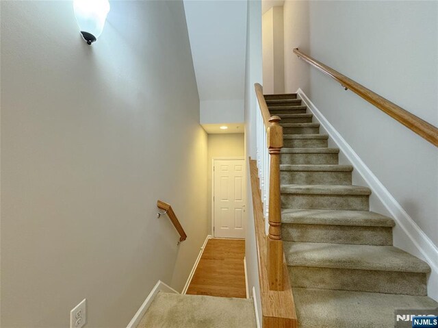 staircase with baseboards