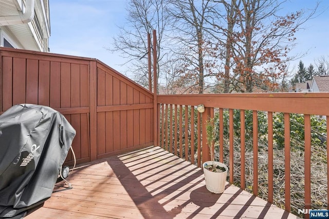 wooden terrace with grilling area