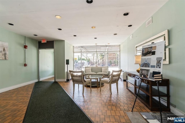 lobby featuring visible vents and a sunroom