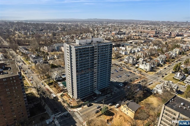 birds eye view of property featuring a city view