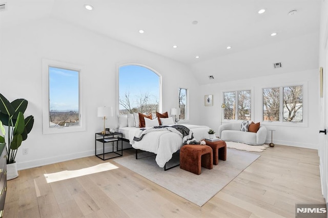 bedroom featuring visible vents, light wood finished floors, baseboards, lofted ceiling, and recessed lighting