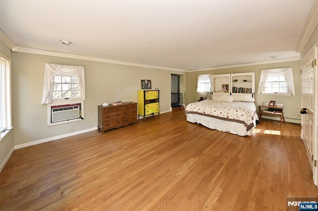 bedroom featuring crown molding, wood finished floors, and a baseboard radiator