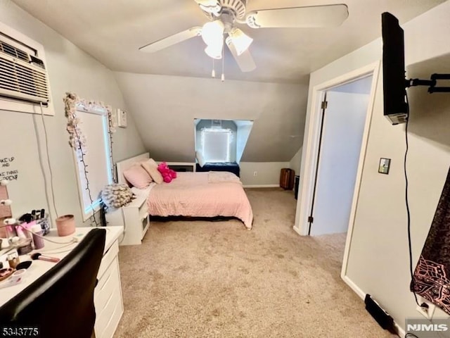 bedroom featuring a ceiling fan, vaulted ceiling, light colored carpet, and a wall mounted AC