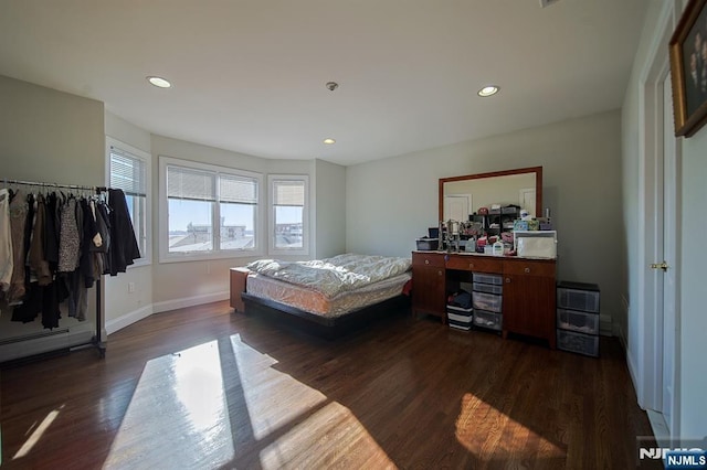 bedroom featuring recessed lighting, dark wood-style flooring, and baseboards