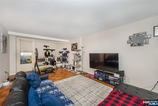 living room featuring baseboards