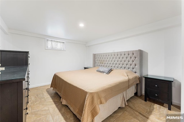 bedroom with recessed lighting and baseboards