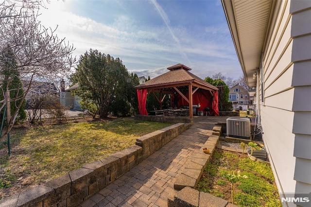 view of yard featuring a gazebo and cooling unit