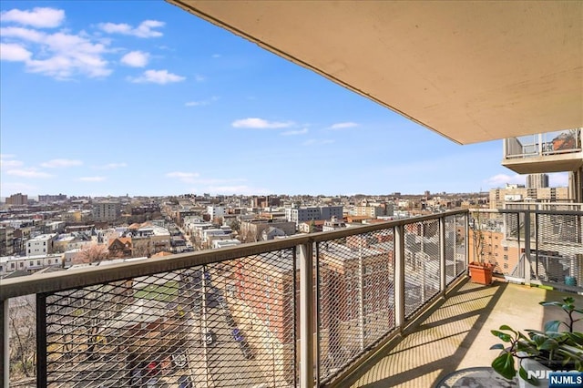 balcony featuring a view of city