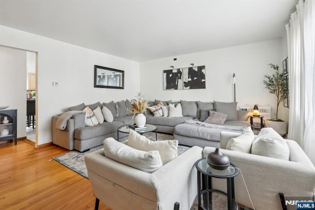 living area featuring light wood-style floors