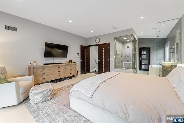 bedroom with recessed lighting, visible vents, and ensuite bathroom