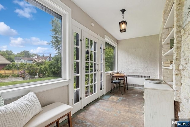 274 Ridgewood, Glen Ridge, NJ 07028 - sunroom / solarium featuring french doors, wood finished floors, and a textured wall
