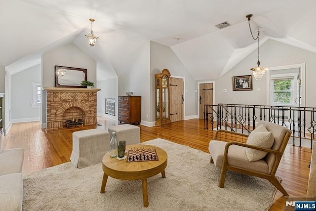 274 Ridgewood, Glen Ridge, NJ 07028 - living area with wood finished floors, a fireplace, lofted ceiling, and an upstairs landing