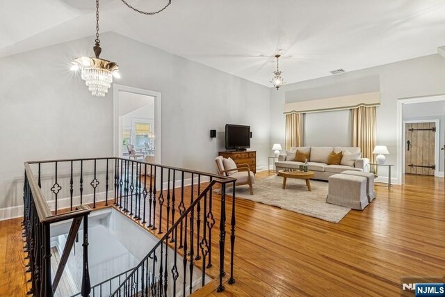 274 Ridgewood, Glen Ridge, NJ 07028 - living area with a chandelier, hardwood / wood-style flooring, and lofted ceiling