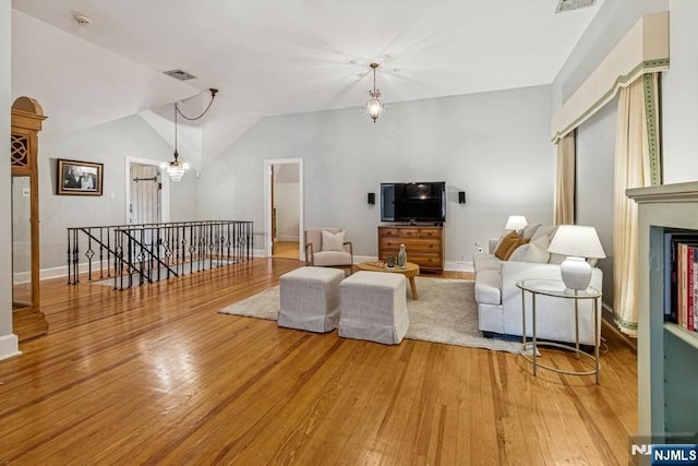 274 Ridgewood, Glen Ridge, NJ 07028 - living room with wood finished floors, vaulted ceiling, a fireplace, and baseboards