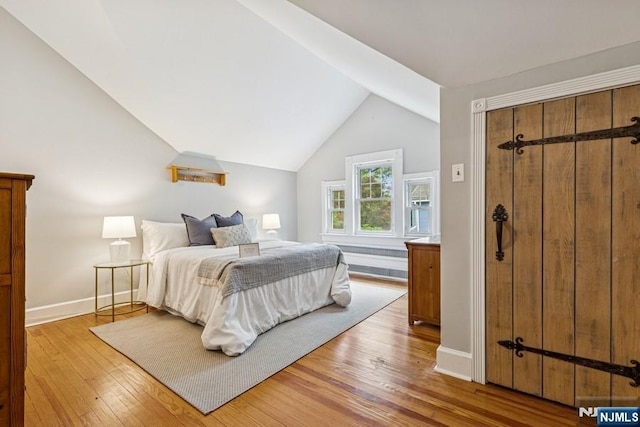 274 Ridgewood, Glen Ridge, NJ 07028 - bedroom featuring light wood-style flooring, lofted ceiling, and baseboards
