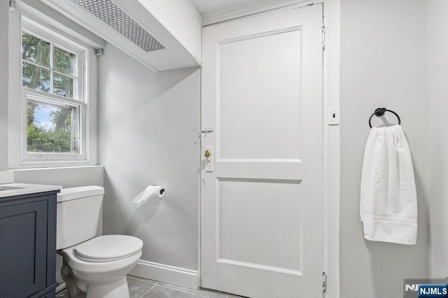 274 Ridgewood, Glen Ridge, NJ 07028 - bathroom featuring toilet, vanity, tile patterned floors, and baseboards