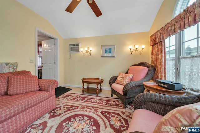 living room featuring tile patterned flooring, a wall unit AC, a ceiling fan, and vaulted ceiling