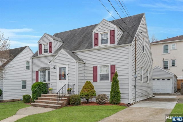 cape cod home featuring a front lawn, driveway, roof with shingles, an outdoor structure, and a garage
