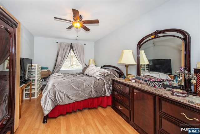 bedroom featuring ceiling fan and light wood finished floors