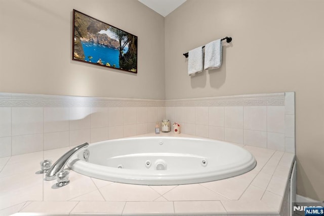 bathroom with a jetted tub