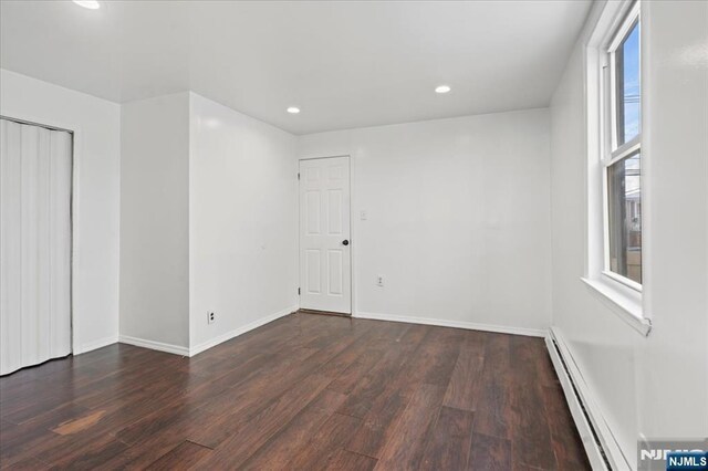 627 Montgomery, Elizabeth, NJ 07202 - empty room featuring recessed lighting, wood finished floors, baseboards, and baseboard heating