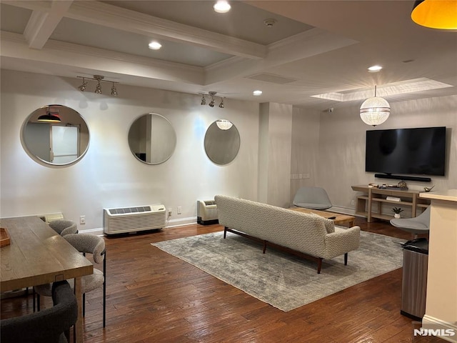 living area with beamed ceiling, wood-type flooring, coffered ceiling, and baseboards
