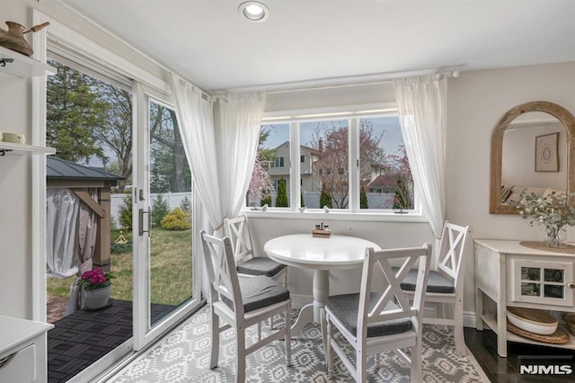 sunroom with a healthy amount of sunlight