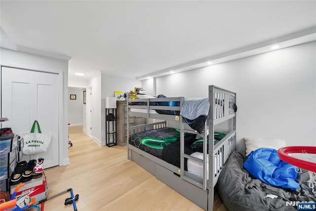 bedroom featuring recessed lighting, baseboards, and wood finished floors