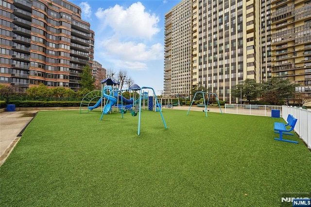 community playground featuring fence
