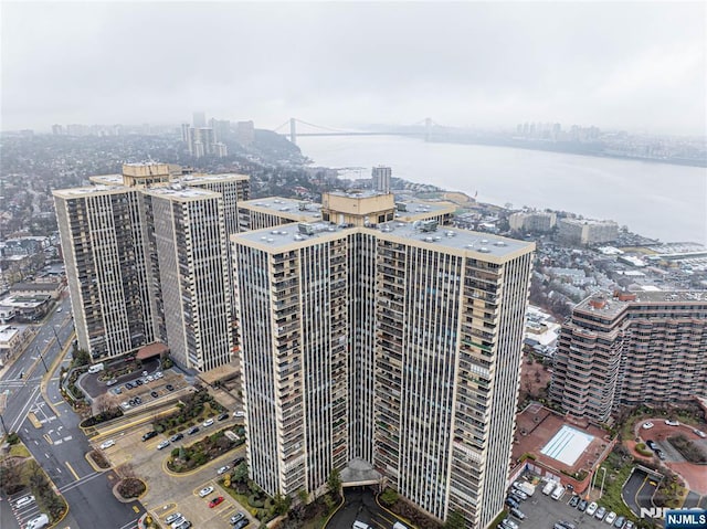 drone / aerial view with a water view and a city view