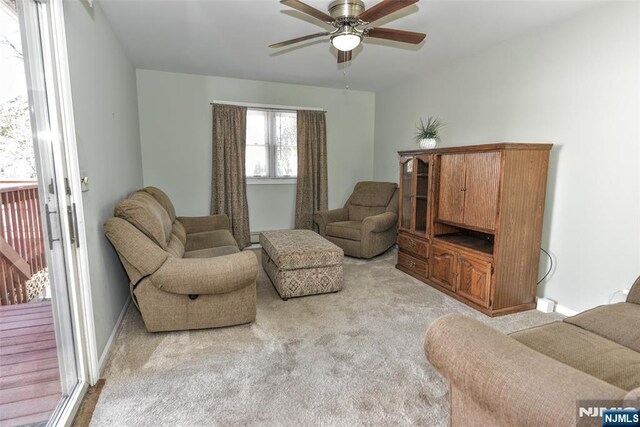 33 Bergen Ave, Waldwick, NJ 07463 - living area featuring baseboards, carpet floors, and ceiling fan