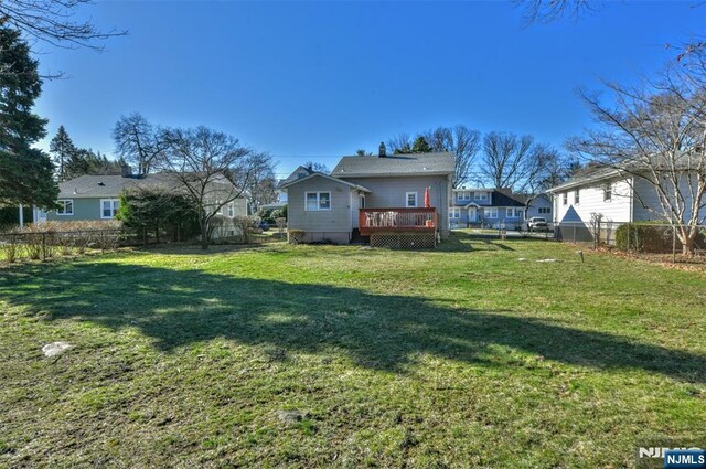 33 Bergen Ave, Waldwick, NJ 07463 - exterior space featuring a wooden deck and a fenced backyard
