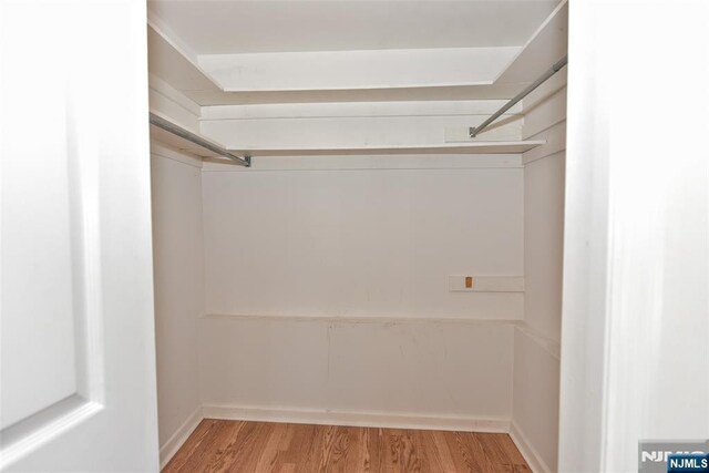 33 Bergen Ave, Waldwick, NJ 07463 - walk in closet with wood finished floors