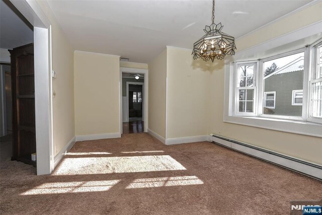 33 Bergen Ave, Waldwick, NJ 07463 - unfurnished dining area featuring ornamental molding, carpet, an inviting chandelier, a baseboard radiator, and baseboards