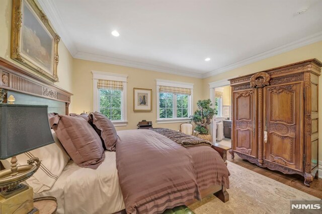 74 Roberts Rd, Englewood Cliffs, NJ 07632 - bedroom with recessed lighting, wood finished floors, and ornamental molding