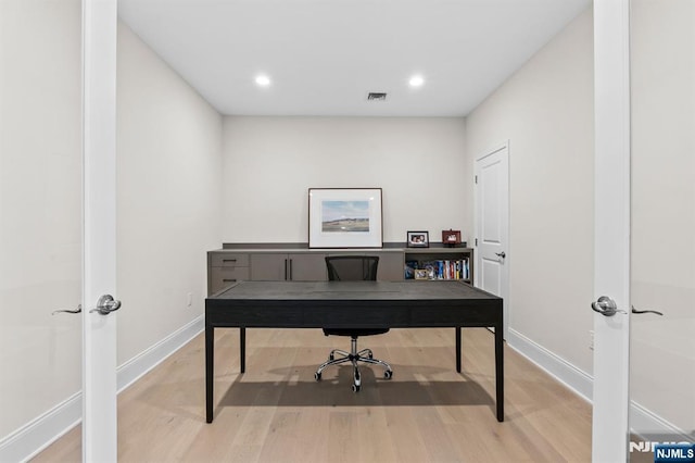 office area featuring recessed lighting, baseboards, light wood-style floors, and visible vents