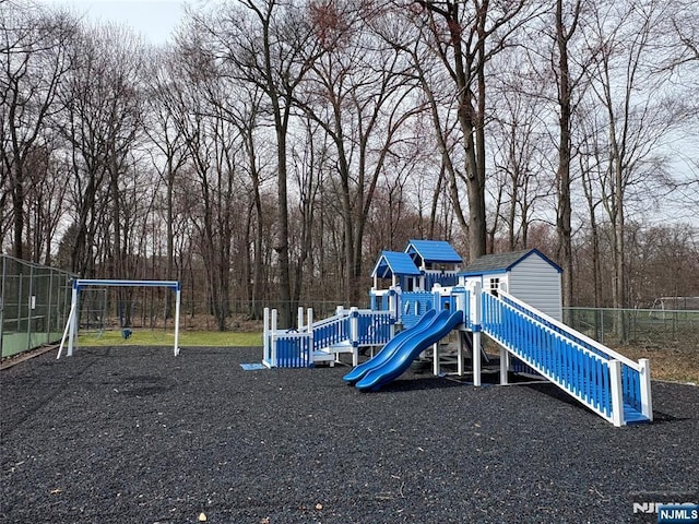 community playground featuring fence