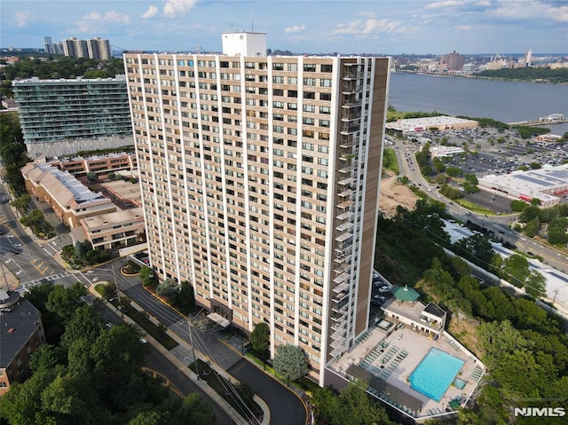 aerial view featuring a water view and a city view