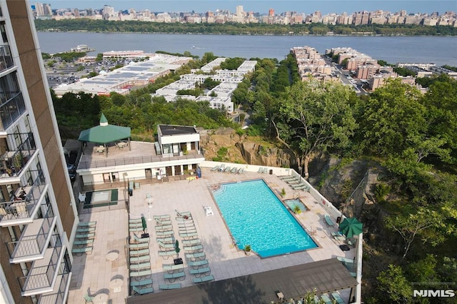 drone / aerial view with a water view and a city view