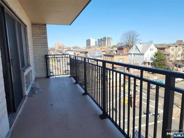 balcony featuring a view of city