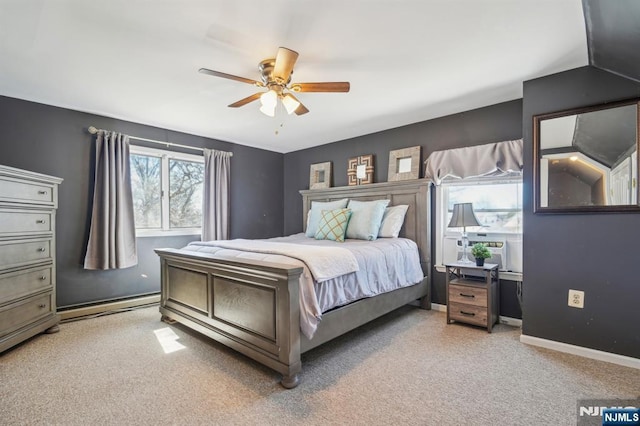 bedroom featuring baseboards, ceiling fan, a baseboard heating unit, and light colored carpet