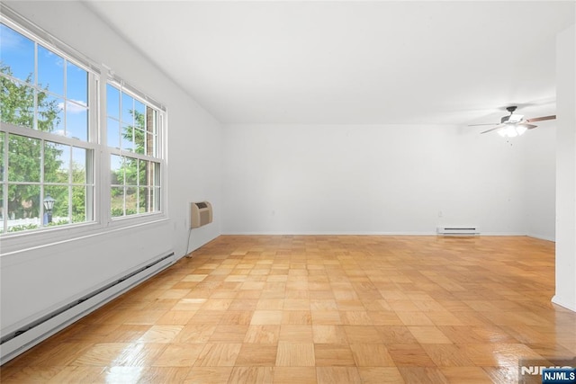 74 E Maple St, Teaneck, NJ 07666 - bonus room with baseboard heating, a ceiling fan, and baseboards