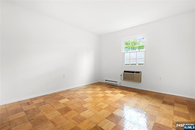 74 E Maple St, Teaneck, NJ 07666 - empty room featuring a baseboard heating unit, a wall unit AC, and baseboards
